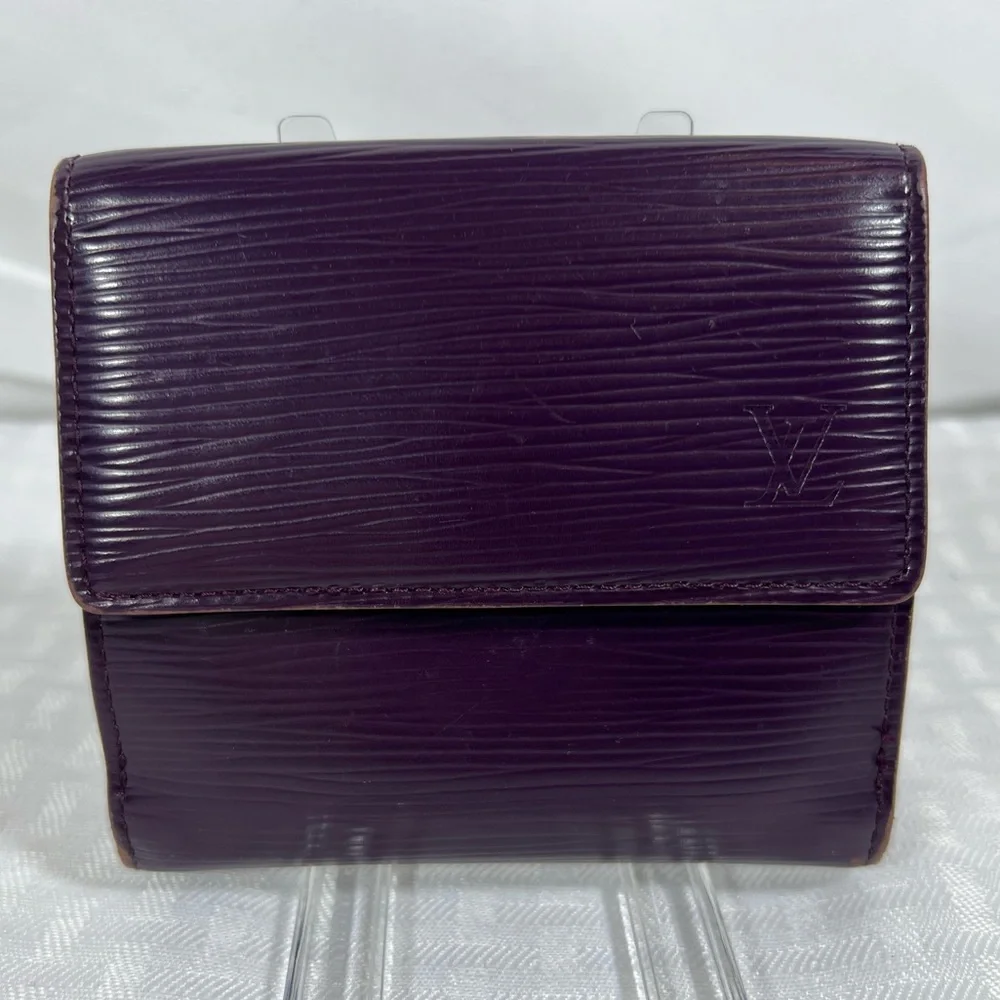 1136: Louis Vuitton Epi Leather Trifold Wallet Purple